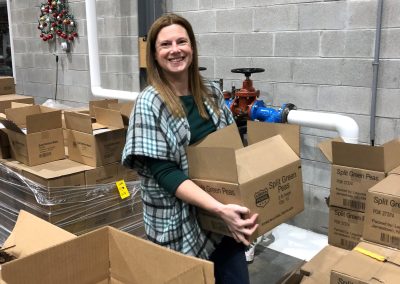 Elizabeth Walthall volunteering at the Virginia Peninsula Food Bank; December 2023