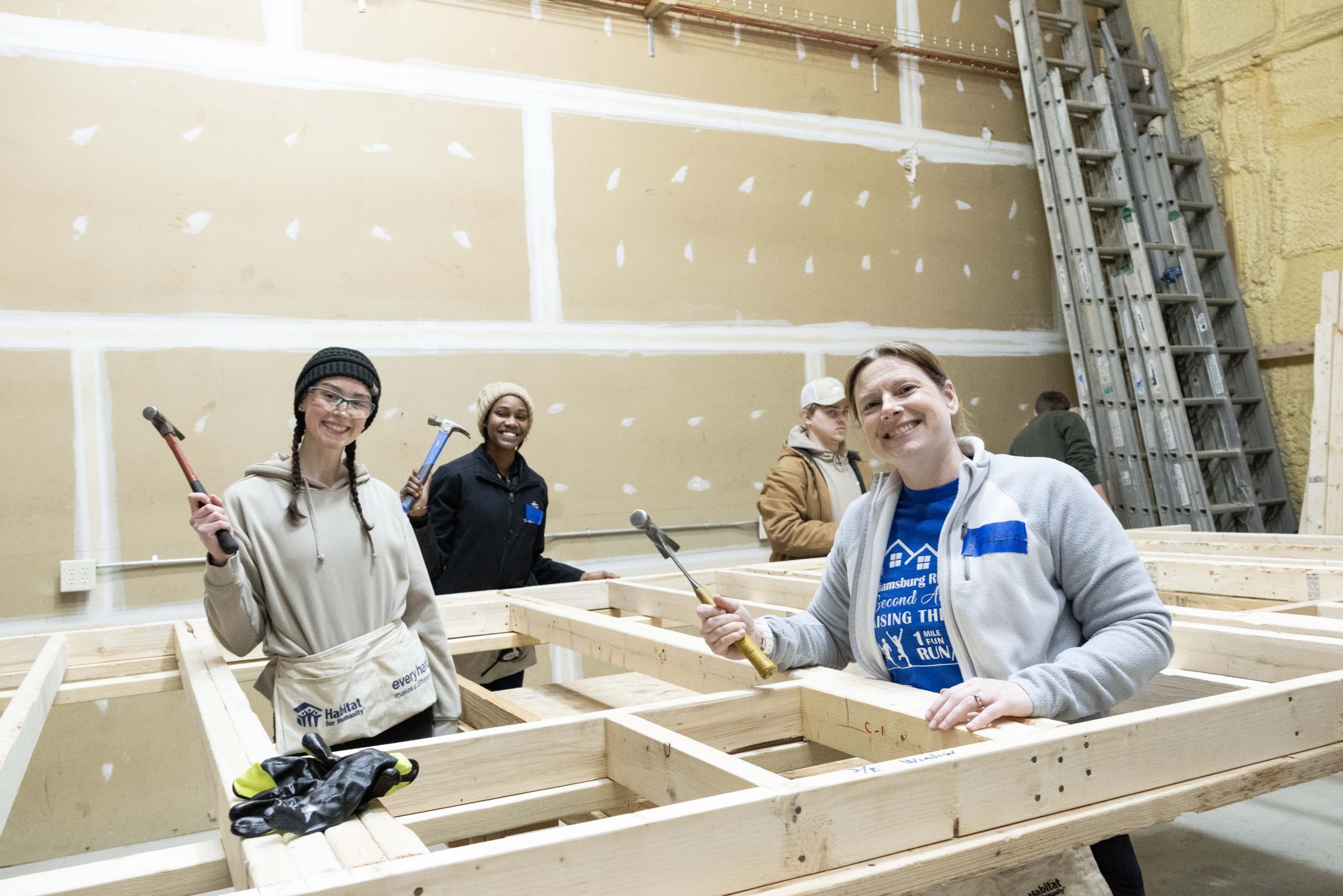 Williamsburg REALTORS® Joins Habitat for Humanity’s Build Day to Construct Home for Robinson Family